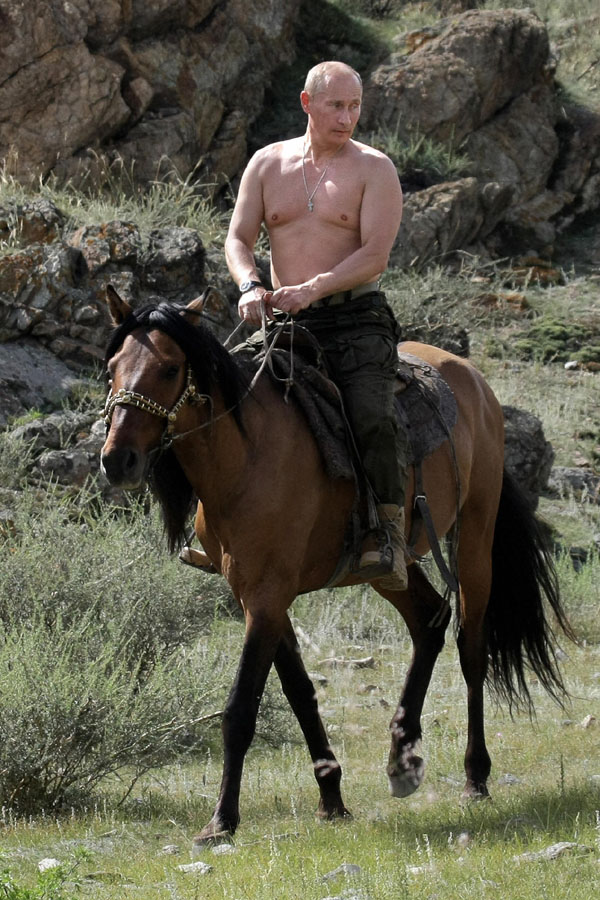 Bare-chested Putin on horseback